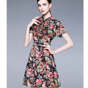 Dalia MacPhee Short Sleeve Tie Neck Floral Mini Dress With Lace Trim